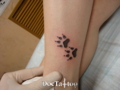 Cat's paw tattoo