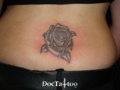 Rose lowerback tattoo